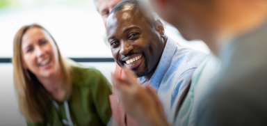 People laughing in an office